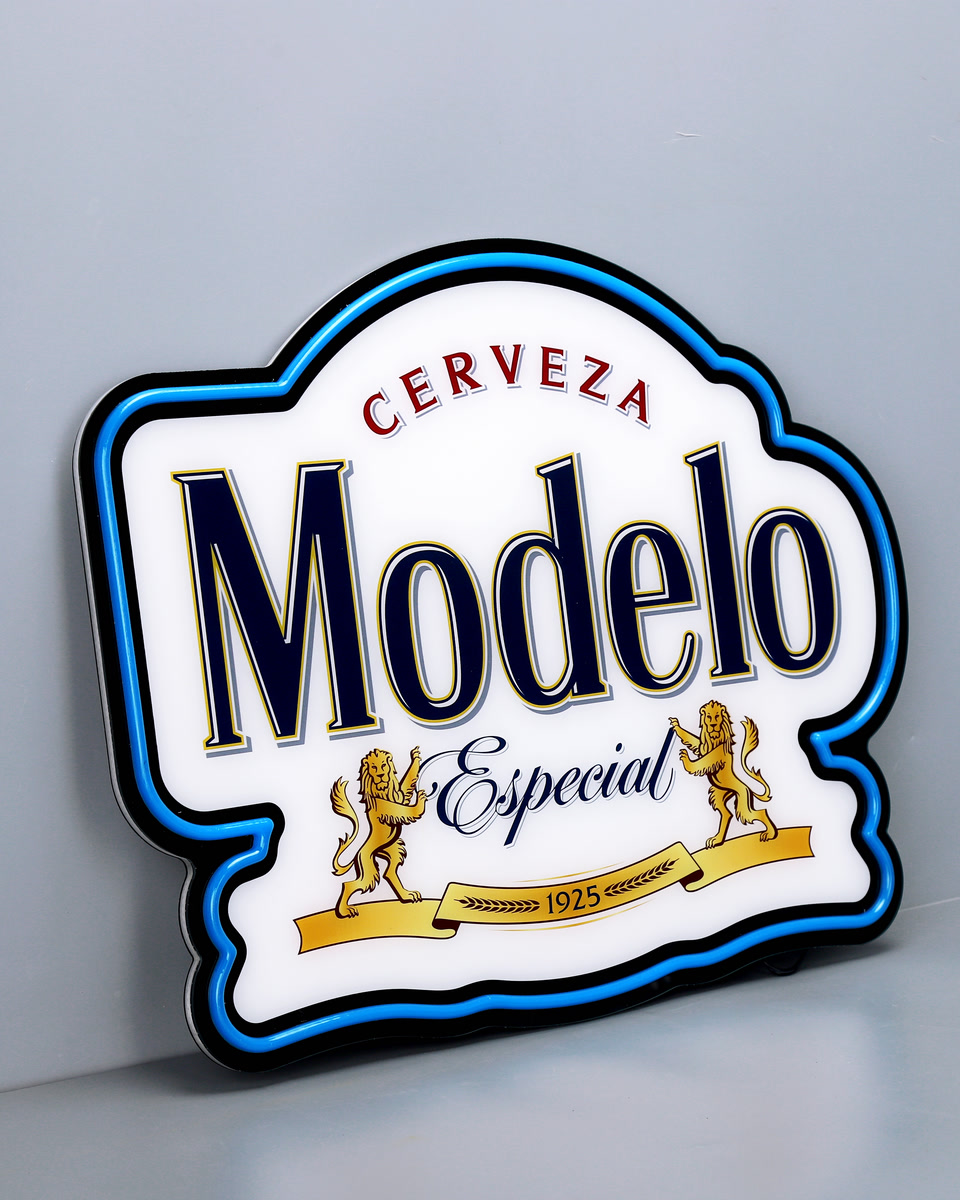 Custom-shaped Modelo LED light box with a printed logo and blue illuminated outline
