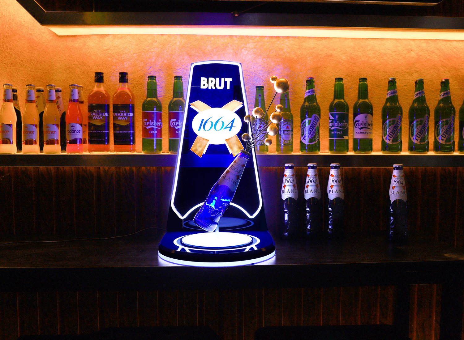 Custom illuminated bottle glorifier manufactured by RUOMEI