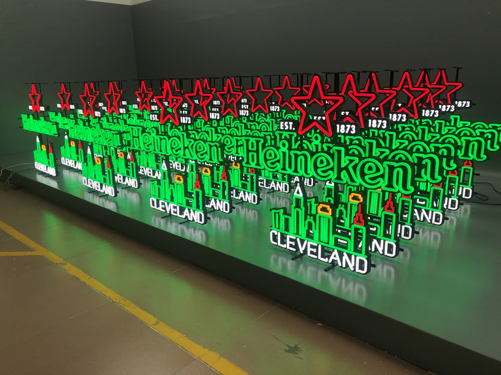 Batch of illuminated signs undergoing aging testing