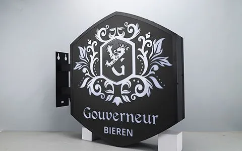 Shield-shaped sign with a mounting bracket
